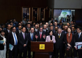 President of the Legislative Council Andrew Leung, center, and lawmakers attend a press conference following the passing of the Basic Law Article 23 legislation at the Legislative Council in Hong Kong, Tuesday, March 19, 2024. Hong Kong lawmakers unanimously approved a new national security law on Tuesday that grants the government more power to quash dissent, widely seen as the latest step in a sweeping political crackdown that was triggered by pro-democracy protests in 2019. (AP Photo/Louise Delmotte) © Provided by The Associated Press